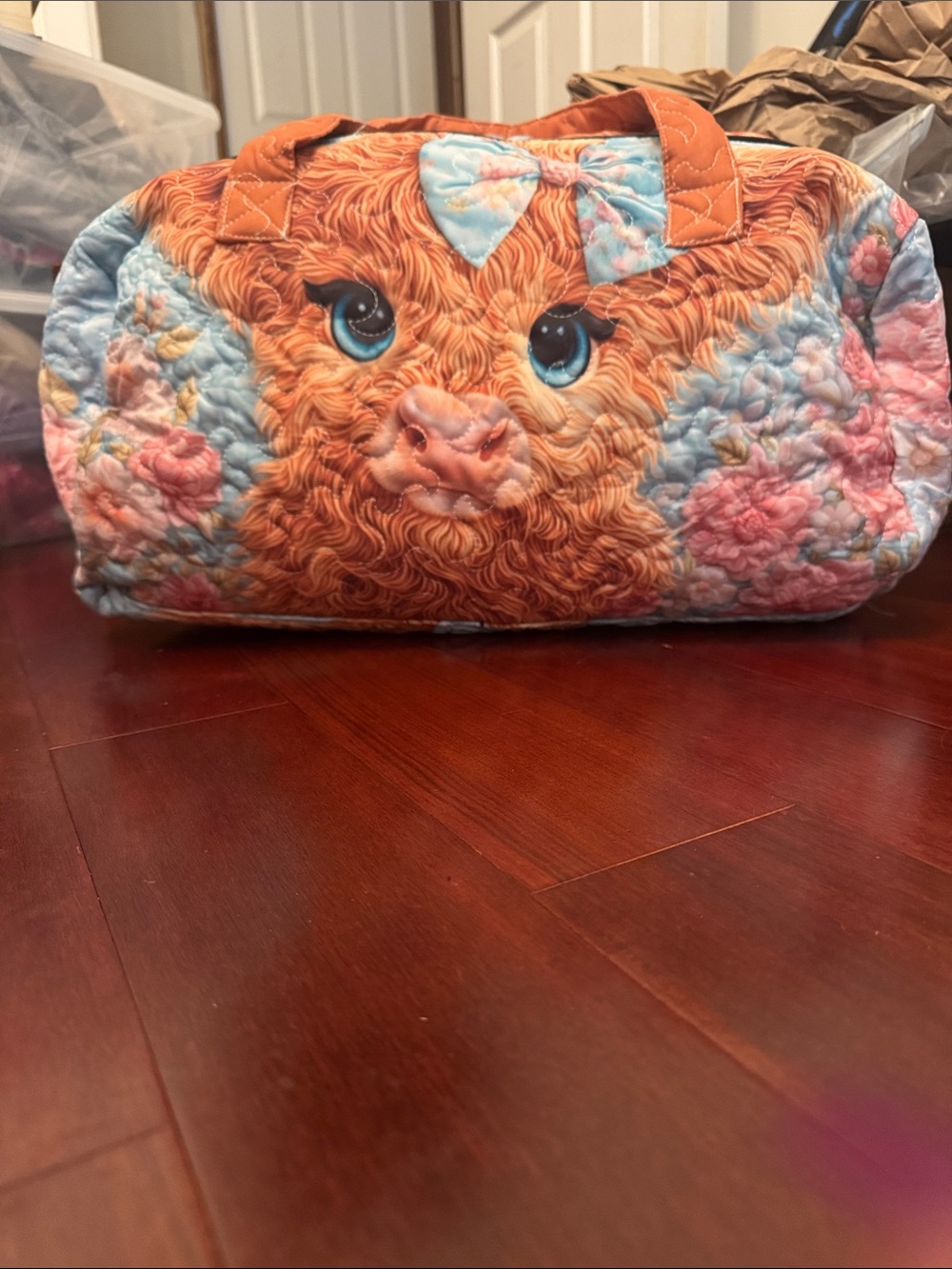 Quirky Floral High land cow Quilted Duffle Bag in Orange & Light Blue